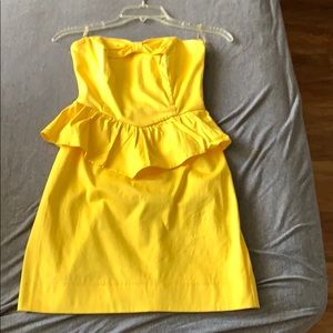 Strapless yellow mini dress